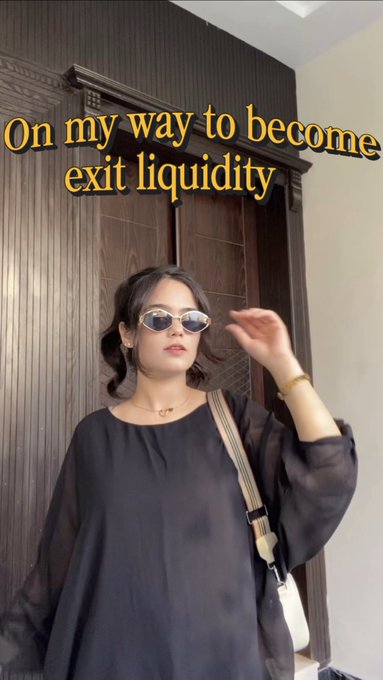 A young woman wearing sunglasses and a black top poses indoors with text overlay reading 'On my way to become exit liquidity'.