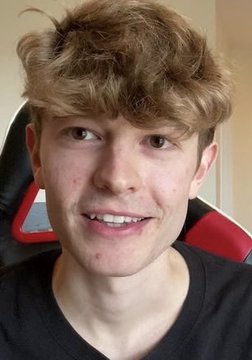 A selfie of a smiling young man with curly reddish-brown hair, sitting in a red and black gaming chair. The image appears to be FaZe Blaze, the trader mentioned in the post, who has earned over $7,000 in PumpFun creator rewards despite a realized loss of -$7,400.