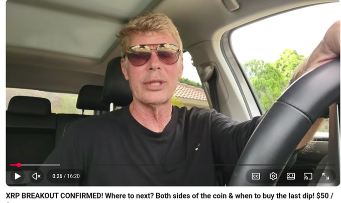 A screenshot of a YouTube video thumbnail titled "XRP BREAKOUT CONFIRMED! Where to next? Both sides of the coin & when to buy the last dip! $50 /," showing a man wearing sunglasses and a black shirt speaking while seated in a car. The video is at the 0:26 mark of a 16:20 runtime, featuring XRP007's episode discussing XRP's price breakout and potential target levels of $50 to $100.