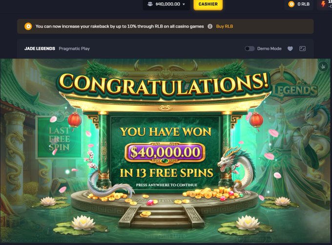 A casino slot game 'Jade Legends' by Pragmatic Play congratulating the player for winning $40,000.00 in 13 free spins, displayed against an ornate Asian-themed background with dragons, gold coins, and pink lotus flowers.