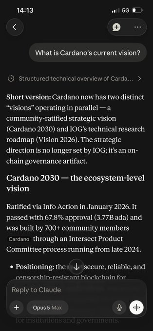 A smartphone screenshot of a Claude AI conversation responding to 'What is Cardano's current vision?' with text explaining Cardano 2030 and IOG's Vision 2026, noting 67.8% approval with 3.77B ada.