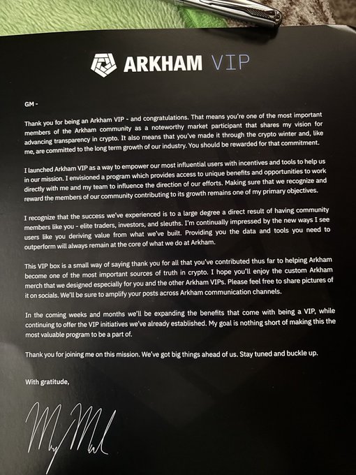 A black VIP welcome letter from Arkham, addressed to a GM, thanks the recipient for joining the community, mentions a custom Arkham VIP NFT, and is signed in cursive.