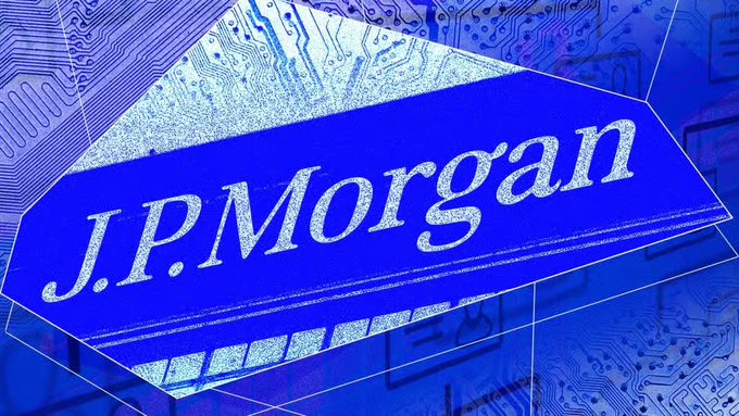 The J.P. Morgan logo displayed in white text on a blue background with a circuit board pattern, suggesting a fintech or blockchain context.