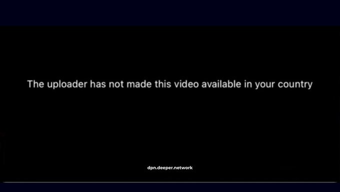 A black screen displays the message "The uploader has not made this video available in your country" with "dpn.deeper.network" at the bottom.