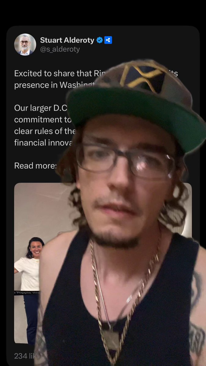 The image features a man wearing glasses, a black tank top, and a green baseball cap with a yellow X on it. He has a tattoo on his arm. The caption of the image includes information about Ripple expanding to DC.