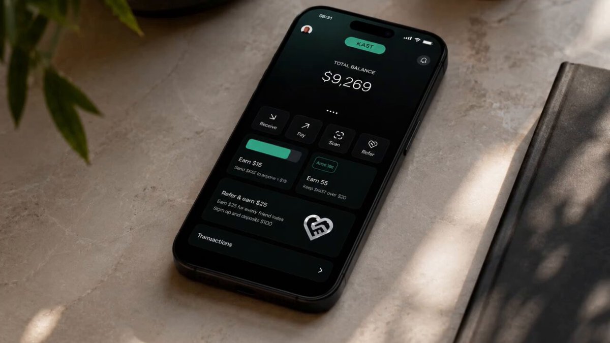 The image features a black smartphone sitting on top of a surface, with a book behind it. The screen of the phone displays information about Stablecoin usage, including steps for installing and using the app. A small heart symbol appears next to some text on the phone's screen, possibly indicating an achievement or accomplishment related to using stablecoins effectively.