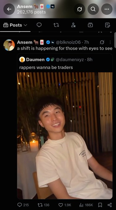 This image shows a tweet from Daumen stating "rappers wanna be traders," which relates to the accompanying post's discussion of accumulating the "$kimchi" crypto ticker and potential collaborations in the trading community.