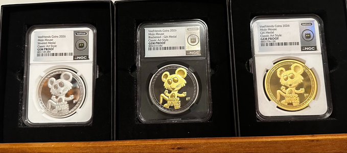 Three NGC-graded VeeFriends Coins 2026 medals displayed in protective cases: one silver 'Clever Cat' and two gold 'Moji Mouse' coins, both GEM PROOF.