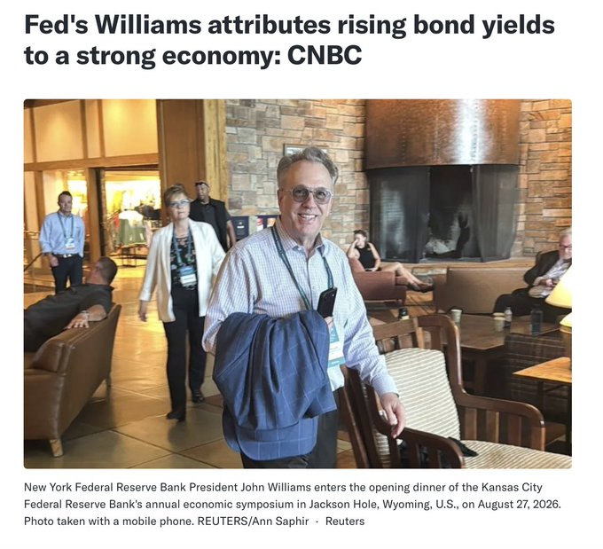 John Williams, President of the New York Federal Reserve Bank, is shown arriving at the Kansas City Fed's annual economic symposium in Jackson Hole, Wyoming, on August 27, 2026, with a Reuters/CNBC headline noting he attributes rising bond yields to a strong economy—context that aligns with the post's discussion of his dovish-leaning signals on inflation and the September rate hike case.
