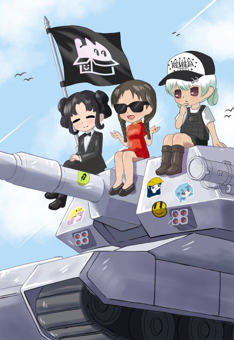 An anime-style illustration of three chibi characters sitting atop a tank, one holding a black flag with a pink logo; the character on the right wears a cap reading "KEMILLA".