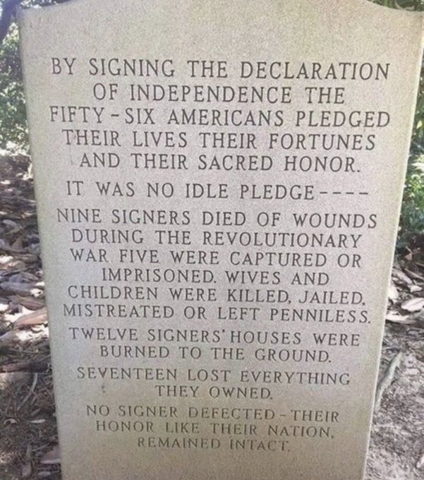 A stone memorial inscription detailing the sacrifices of the 56 signers of the Declaration of Independence, noting that nine died of war wounds, five were captured, twelve had their homes burned, and seventeen lost everything they owned—yet none defected, honoring their commitment to the founding of the nation.