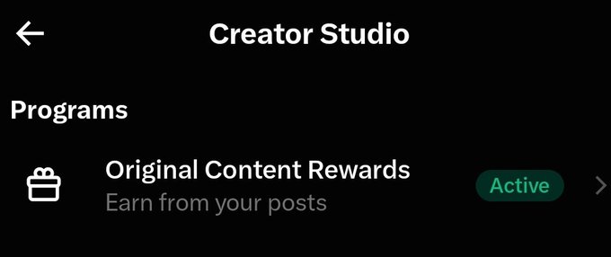 The Creator Studio page shows the "Original Content Rewards" program as "Active" with the description "Earn from your posts," confirming the user's eligibility for the program. This serves as proof of their status as an original content creator on the platform.