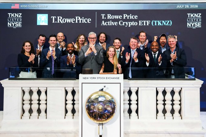 The T. Rowe Price team celebrating the listing of their Active Crypto ETF (TKNZ) at the New York Stock Exchange on July 29, 2026, around the closing bell.