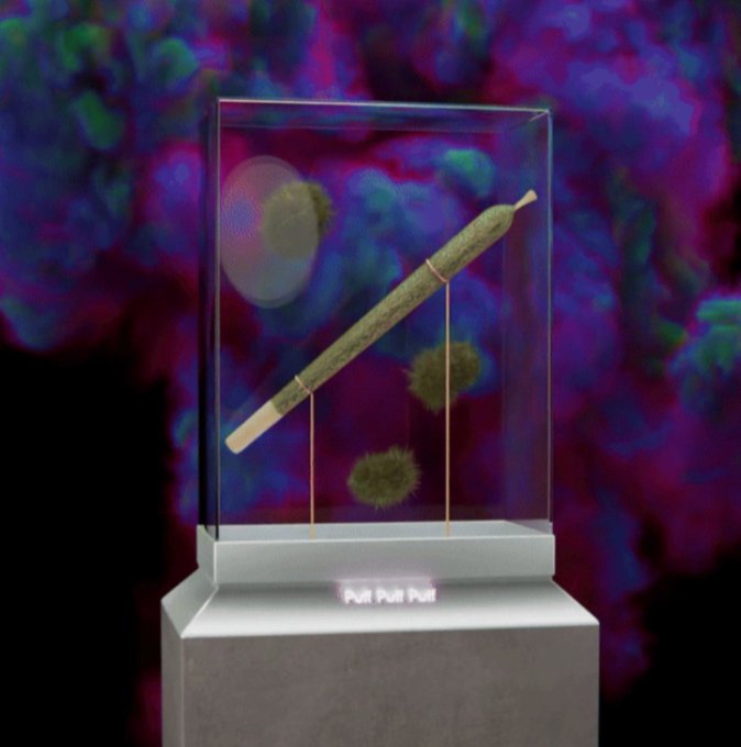 A glass display case sits on a pedestal, containing what appears to be a large, rolled joint suspended by thin wires, with fuzzy floating objects and a colorful psychedelic background; a small plaque at the base reads "Putt Putt Putt".