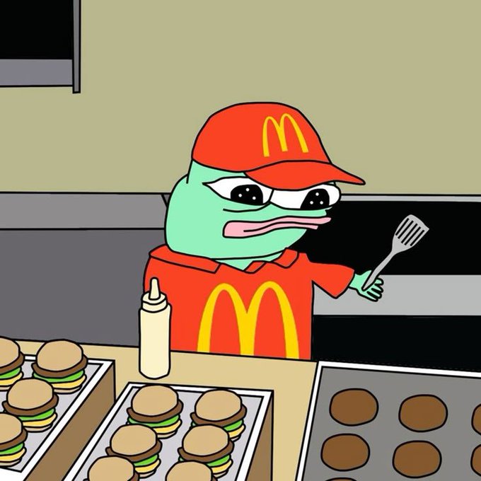 A cartoon illustration of a Pepe the Frog character dressed as a McDonald's employee, wearing the iconic red and yellow uniform and hat, holding a spatula behind a counter with burgers and patties.