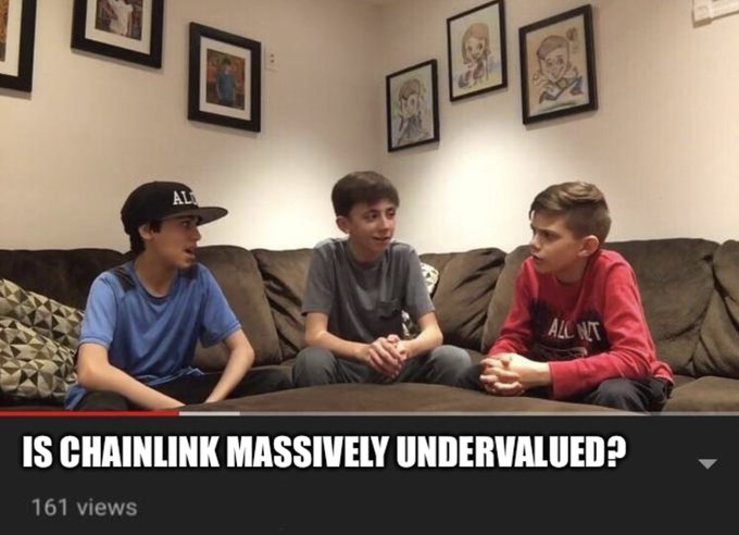 Three teenage boys sit on a couch during a YouTube video titled 'IS CHAINLINK MASSIVELY UNDERVALUED?' which has 161 views.
