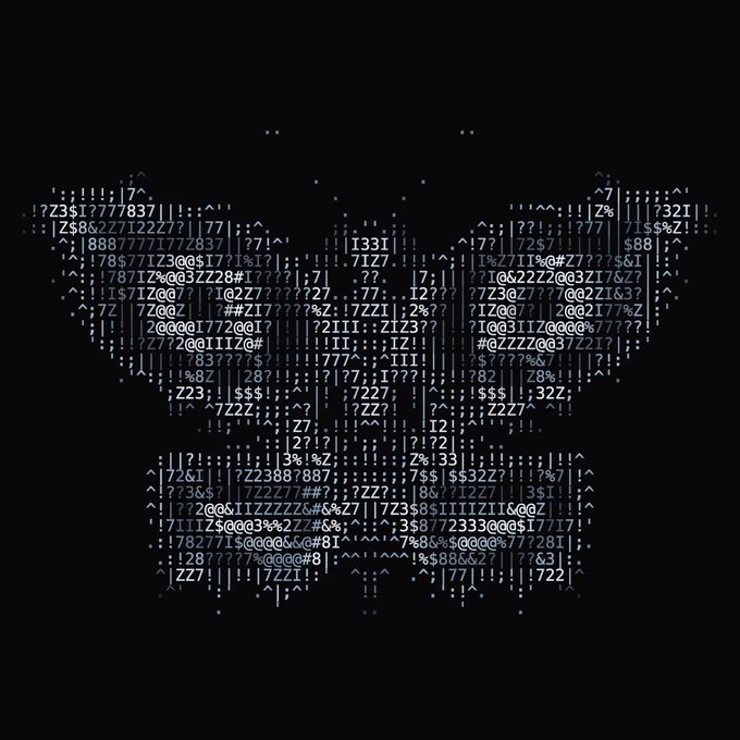 ASCII art rendering of a skull/bat-like face made from characters, numbers, and symbols on a black background.