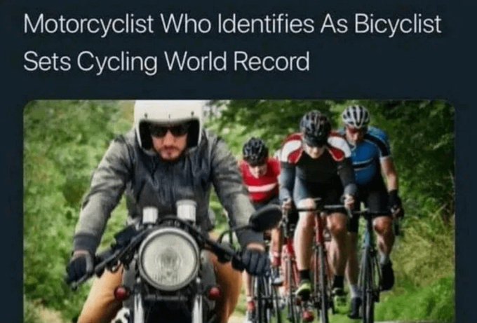 A humorous news headline reads "Motorcyclist Who Identifies As Bicyclist Sets Cycling World Record" above an image of a motorcyclist riding alongside bicycle riders on a road.