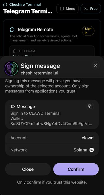A Telegram Wallet sign-in confirmation screen on Cheshire Terminal for 'clawd' account on the Solana network, showing a message prompt with a Confirm button.