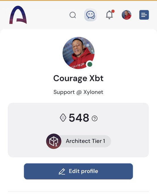 The image shows a user profile for "Courage Xbt" displaying a balance of 548 tokens and an "Architect Tier 1" badge, celebrating the achievement of Architect status on the platform in line with the post's shoutout to new Architects reaching this tier ahead of Mainnet.
