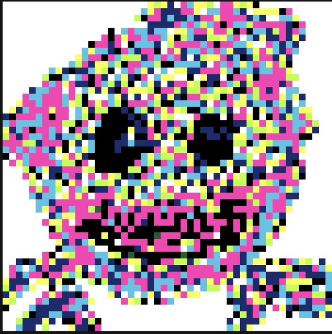 A colorful pixel art skull composed of scattered blocks in pink, blue, yellow, and black with hollow eyes and a grinning mouth.