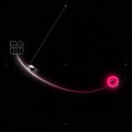 A dark, low-resolution image shows a glowing red dot or circular light connected by a faint streak on a black background.