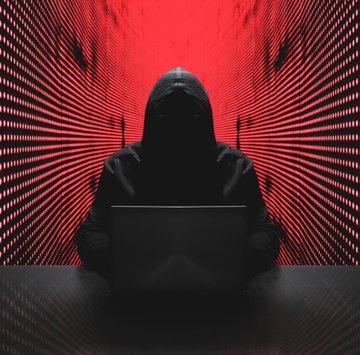 A shadowy hooded figure at a laptop symbolizes the anonymous hacker behind the $23.75 million Ostium RWA protocol exploit on Arbitrum, where compromised oracle permissions were used to drain the liquidity vault.
