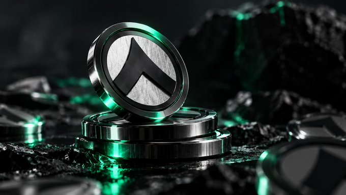 A 3D-rendered image showing a metallic silver coin featuring a stylized upward arrow logo, surrounded by glowing green light against a dark rocky background.