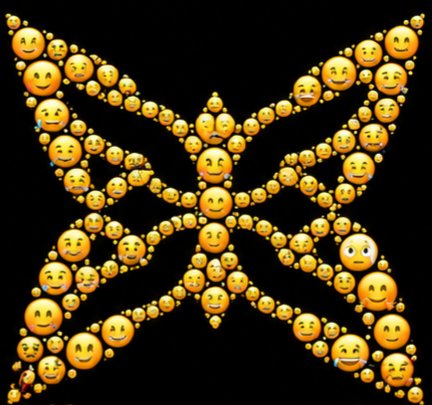 An artistic pattern on a black background made of orange emoji faces in various expressions arranged in a symmetrical web-like design.
