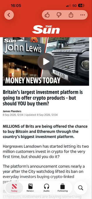 A screenshot of a mobile article from The Sun newspaper titled 'Britain's largest investment platform is going to offer crypto products - but should YOU buy them?' by James Flanders.