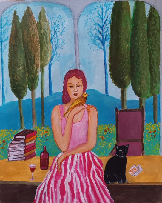 A vibrant folk-style painting of a woman in a pink dress holding a yellow bird, seated outdoors with a black cat, wine bottle, books, and cypress trees in the background.