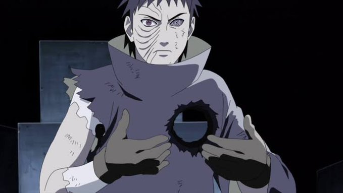 Anime character Obito Uchiha from Naruto, wearing a mask and damaged clothing, revealing his identity.