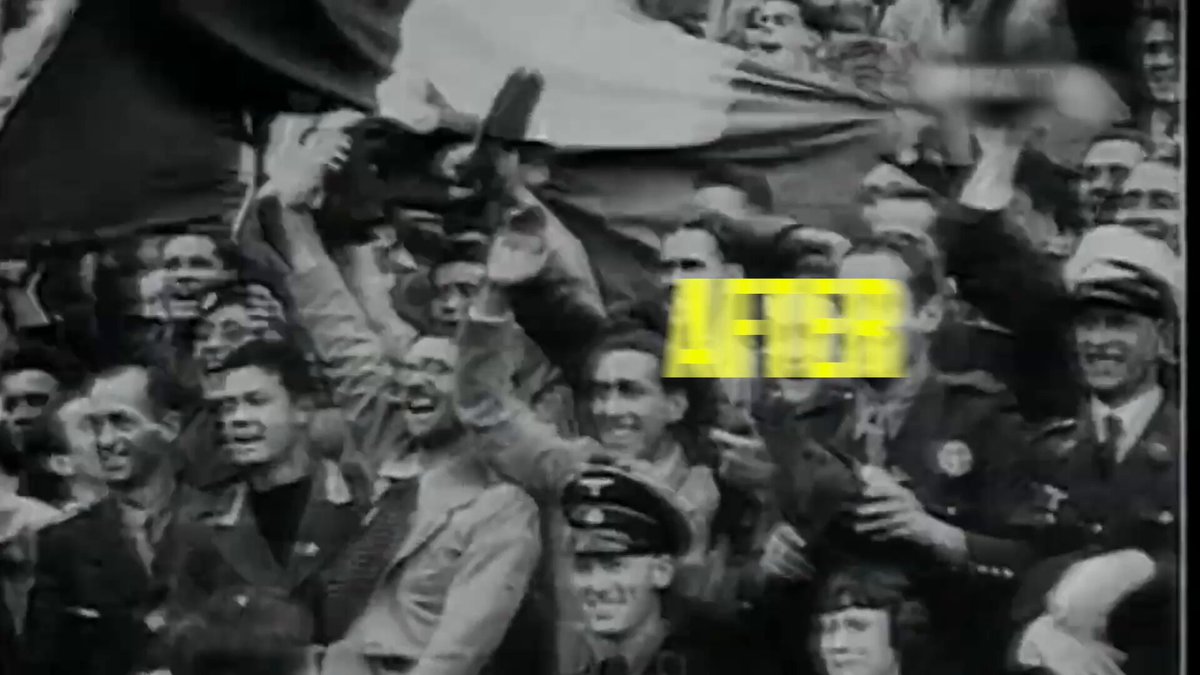 The image features a large crowd of people gathered together behind a barricade or flag, possibly at an event like a sports game or rally. The focus of the scene seems to be the gathering with many people waving flags or banners. There's also a yellow sign in the crowd that reads "AFTER". The post references Prediction markets as a way to trade outcomes, specifically for major events such as the World Cup. This idea suggests that the image may be related to an event like the World Cup where predictions and market trading are prevalent.