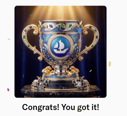 The image features a large, ornate gold trophy with a blue sailboat design on its base. The trophy appears to be made of metal or possibly crystal material, giving it an elegant appearance. It is placed on a marble pedestal, which adds to its grandeur. Surrounding the trophy are numerous small pieces of confetti scattered throughout the scene, creating a festive atmosphere around the award.