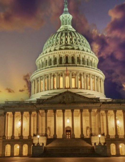 The U.S. Capitol Building is illuminated at dusk against a dramatic sky with purple and orange clouds.