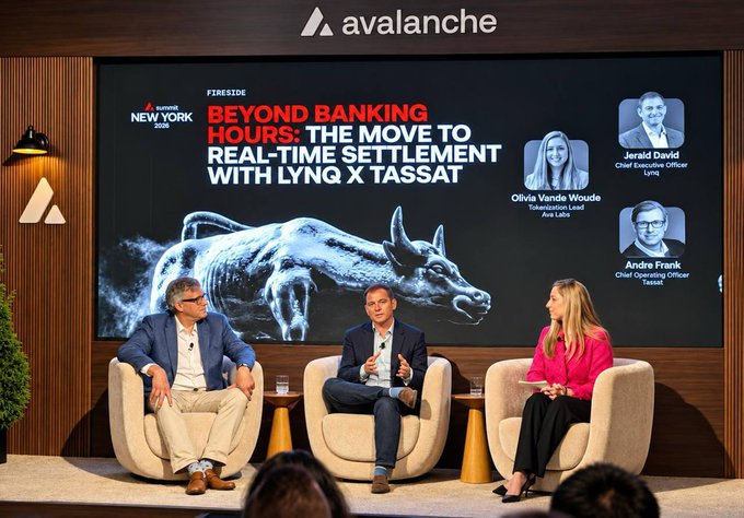 A fireside chat panel at an Avalanche/Fireside event titled 'BEYOND BANKING HOURS: THE MOVE TO REAL-TIME SETTLEMENT WITH LYNQ X TASSAT,' featuring three speakers including Jerald David, Olivia Vande Woude, and Andre Frank.