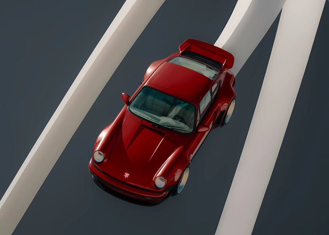 A vibrant red sports car, resembling a Porsche 911, is captured from an aerial perspective as it races along a striped track, embodying a sense of speed and forward momentum.

The image of a sleek red sports car accelerating forward visually reinforces the post's message about progress, as the dynamic scene mirrors the concept of "Keep moving forward" with the JUST DeFi community.