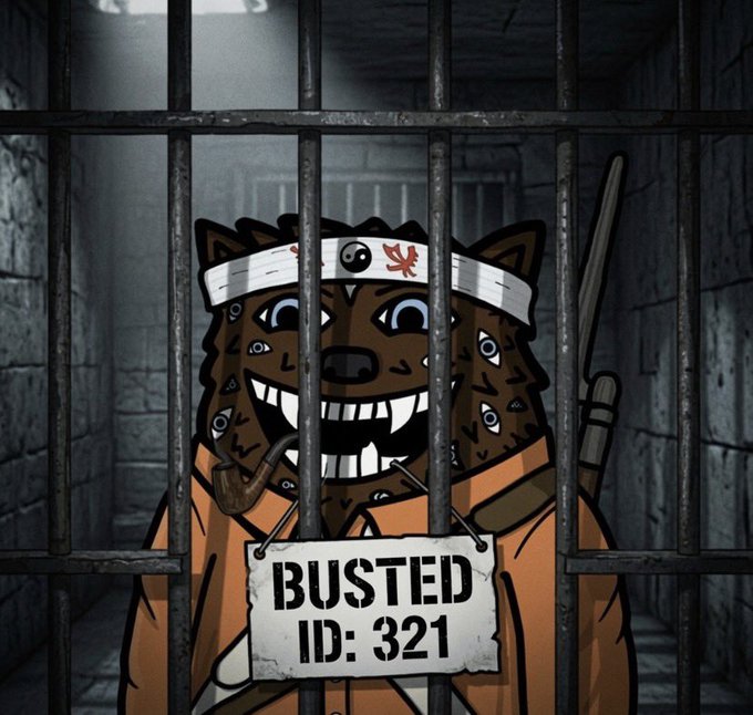 A cartoon bear with multiple eyes and a yin-yang bandana stands behind prison bars wearing a placard that reads "BUSTED ID: 321," visually representing the suspended XRP project "Fuzzy" referenced in the accompanying #freefuzzy post.