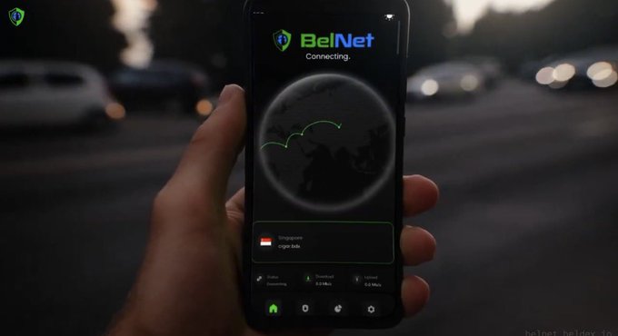 A hand holds a smartphone displaying the "BelNet" app connecting screen with a globe graphic and the text "Connecting." and "Singapore crypto Node," alongside connection metrics showing "1.07 KB/s" download and "0.21 KB/s" upload speeds. The image illustrates the practical privacy tool mentioned in the post, showcasing BeldexCoin's BelNet VPN product as part of their expanding privacy-focused ecosystem.
