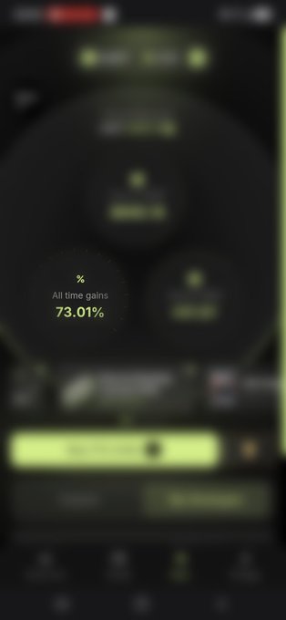 A blurry screenshot of an app interface with a dark theme and green accents, highlighting a statistic that reads 'All time gains 73.01%' with a percentage symbol.