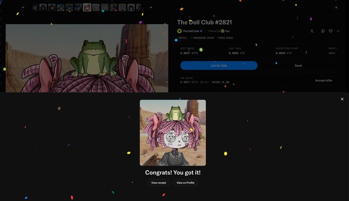 NFT marketplace screenshot showing 'The Doll Club #2821' on OpenSea with a frog character NFT image, displaying ownership details and a 'Congrats! You got it!' popup with a pink-haired character.