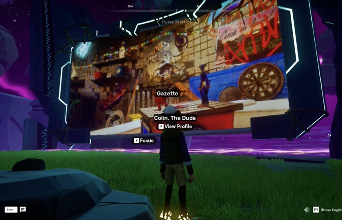 A screenshot from a video game showing a character named "Colin, The Dude" standing in front of a large screen displaying the "Pulse District" area with a "Gazette" sign visible.