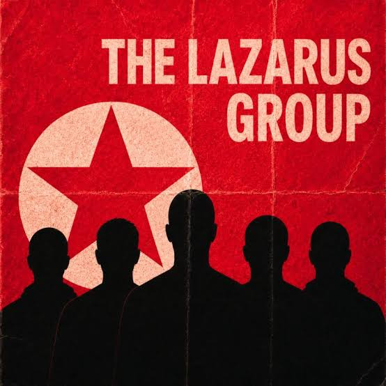 A poster-style image with a red background features the text 'THE LAZARUS GROUP' above silhouettes of hooded figures and a faded red star within a circle.