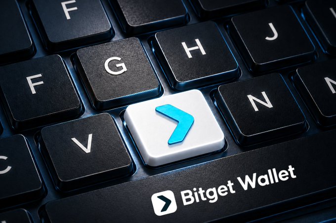 A close-up of a black keyboard featuring a highlighted white key displaying the Bitget Wallet arrow logo, with "Bitget Wallet" branding visible below. The image reinforces the post's message by symbolically presenting Bitget Wallet as the "key" (or keystroke) to unlocking access to the Web3 world.