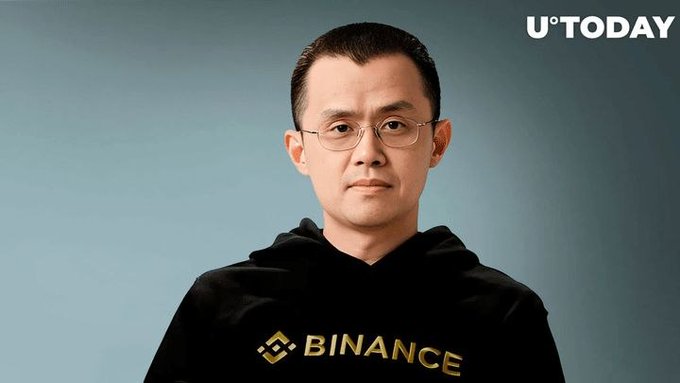 A man wearing glasses and a black hoodie with 'BINANCE' in gold lettering, with 'U°TODAY' watermark in the upper right corner.