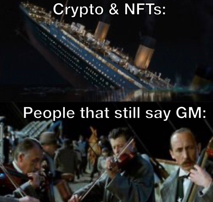 A meme using the Titanic sinking scene captioned 'Crypto & NFTs:' contrasted with a scene of the ship's band continuing to play captioned 'People that still say GM:'.