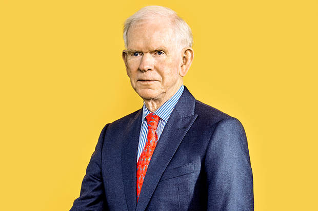 An older man with white hair, wearing a dark blue suit, striped shirt, and red tie, poses against a bright yellow background in a professional headshot. The image accompanies a post claiming that billionaire investor Jeremy Grantham predicted Bitcoin will go to zero, referencing his past accurate calls on the dot-com bubble and 2008 crash.