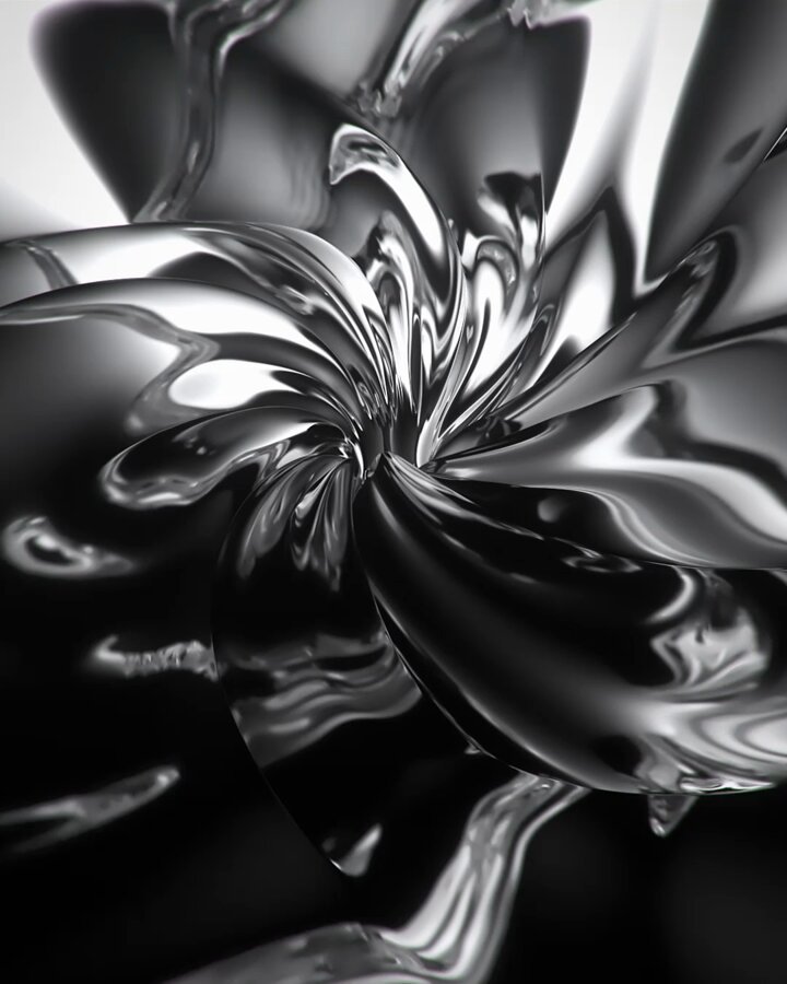 The image features a black and white photo of an abstract design with a metallic sheen, resembling a flower or a swirl pattern. The background appears to be a light brown color, which contrasts with the dark tones of the design. The text "Uniplicate" is present in the image as well.