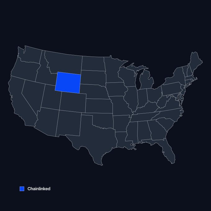 A map of the United States with most states in dark gray highlights Wyoming in blue, with a legend at the bottom left reading "Chainlinked."