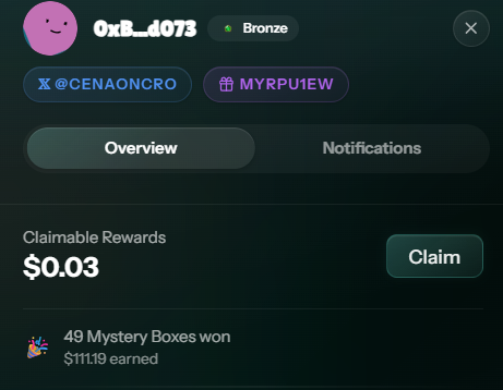 A dark-themed digital profile interface shows the username "0xB_d073" with a Bronze badge, displaying "Claimable Rewards $0.03" and noting "49 Mystery Boxes won, $111.19 earned."